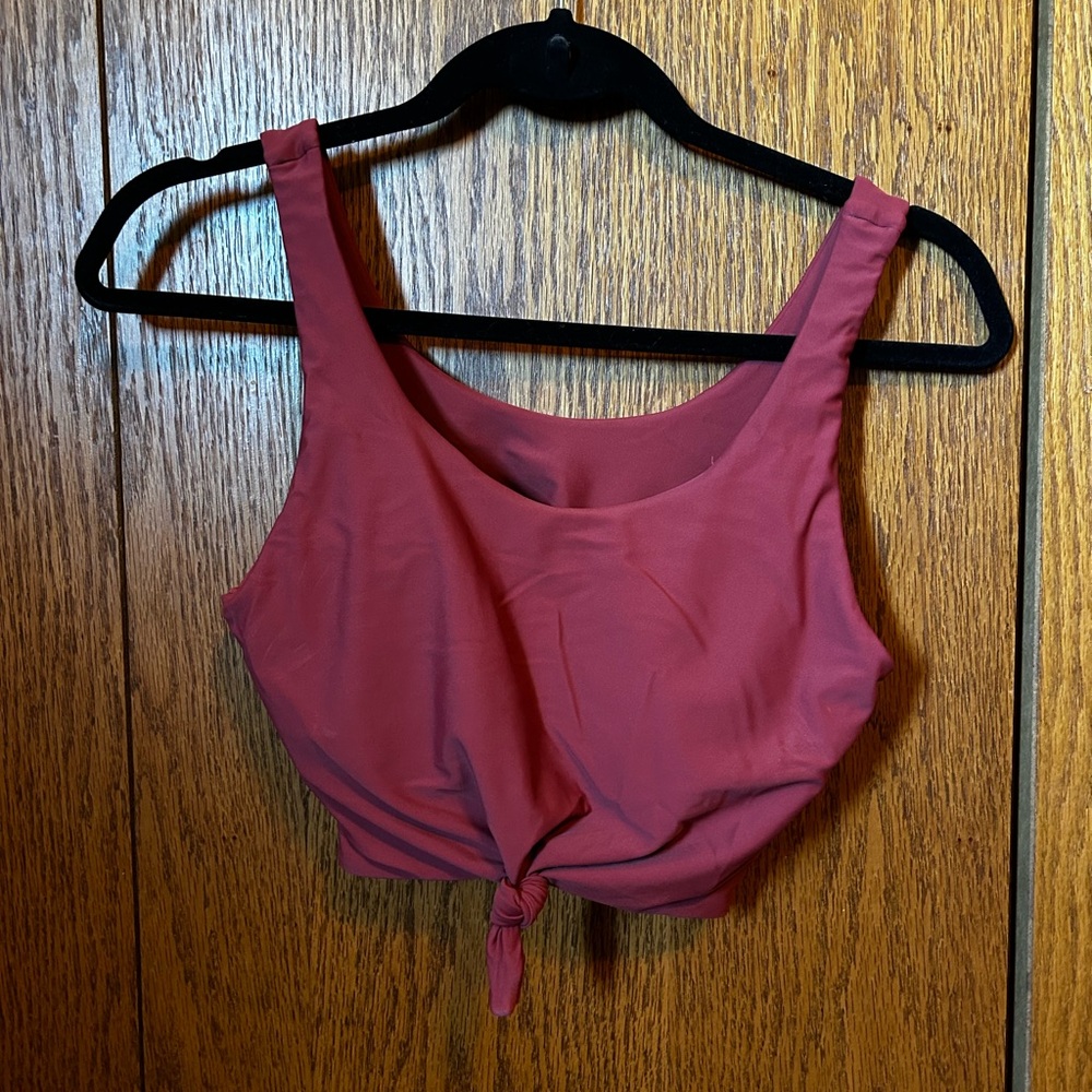 Maroon tankini top that ties in the front size medium.